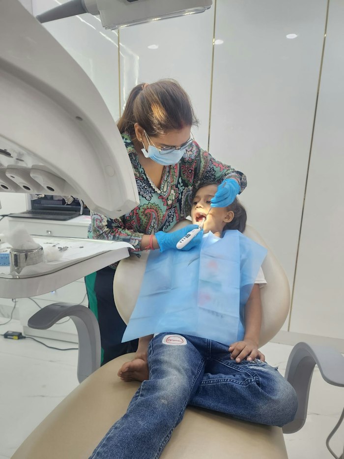 A dentist treating a patient