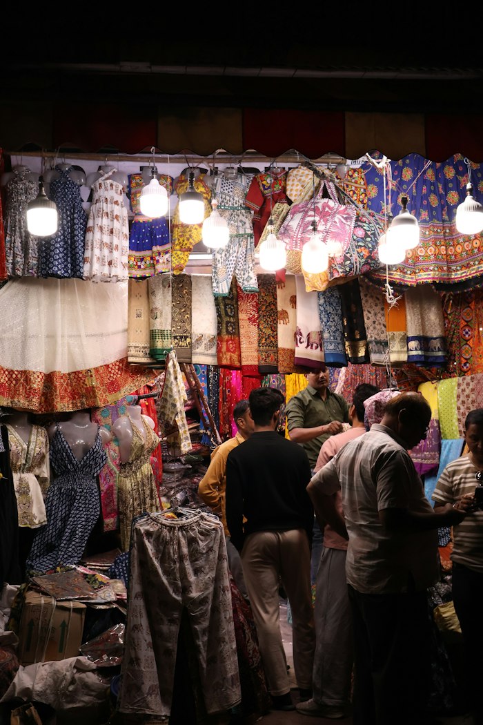 A busy market street with shops